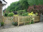 Palisade fence and gate